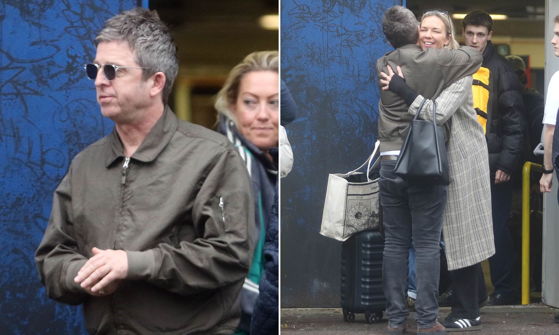 Noel Gallagher and Tori Cook sneak out of Euston Station side exit after a trip to Manchester