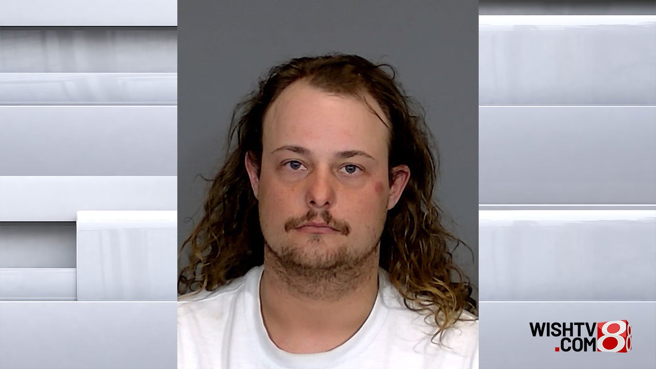 Drunk driver arrested after hitting security guard and IMPD officer in downtown Indianapolis